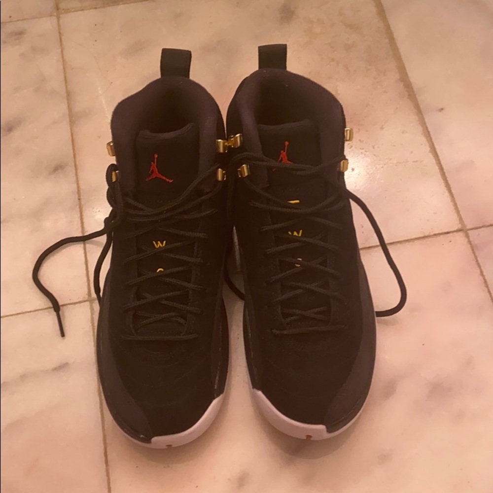 Boys size 5.5 black Jordan 12s
